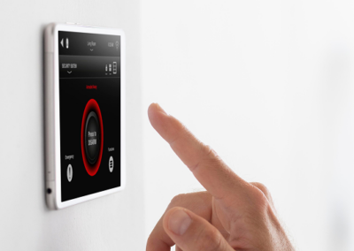 Man using smart home tablet
